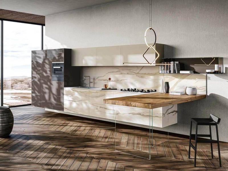 Cuisine haut de gamme de la marque LAGO près d'Uzès avec table intégrée.