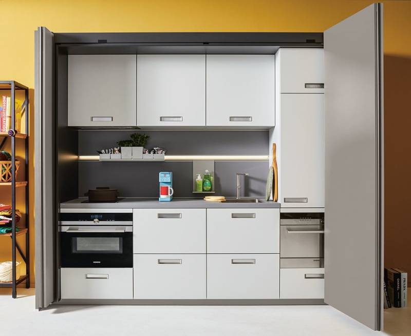 Une cuisine dissimulée grâce au Pocketsystem pour un studio de la marque premium next125 à Nîmes