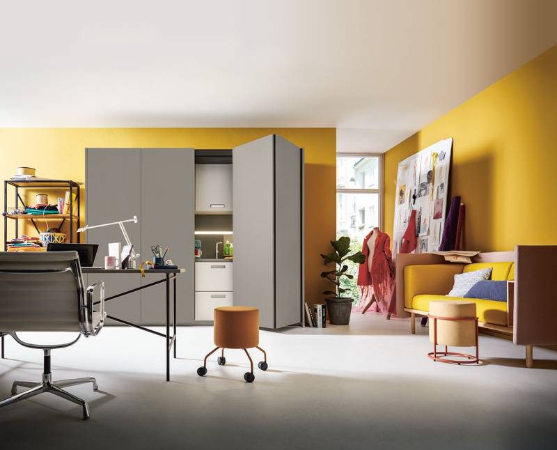 Une cuisine dissimulée grâce au Pocketsystem pour un studio de la marque premium next125 à Nîmes